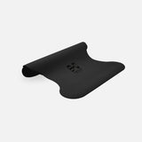 Tapis de sol pour le yoga de la marque hercule studio modèle mar couleur outrenoir packshot semi roulé