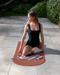 Yoga session with the Hercule Studio Galé Bari Choco comfort pad, natural ergonomic design for Reformer and floor exercises