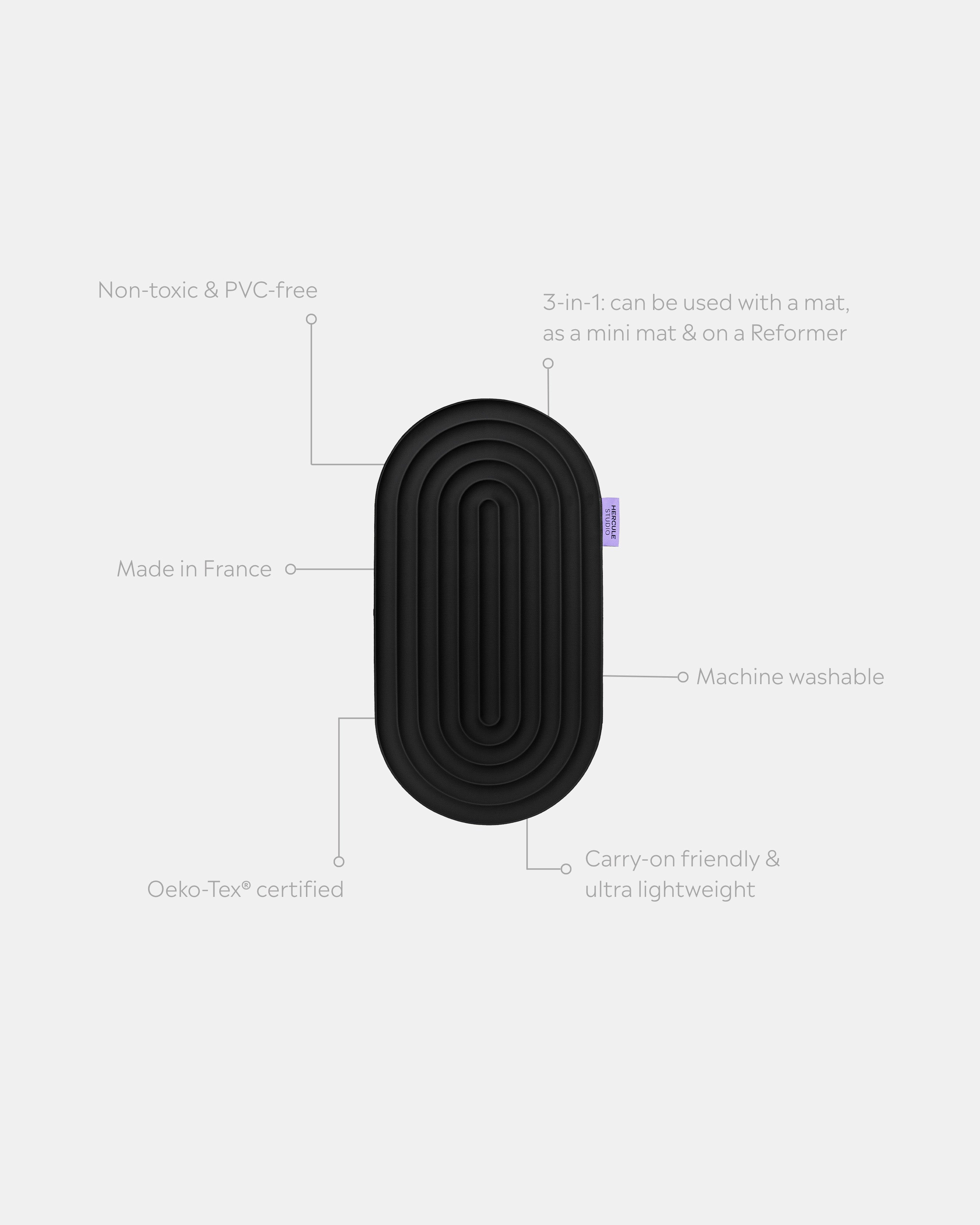 Hercule Studio Galé pad unrolled with informational lines – Midnight Black 3-in-1 mini mat – ergonomic for knees, elbows, glutes, portable and multi-use, Pilates/Reformer compatible, durable French design