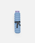 Hercule Studio Galé mini mat – blue jean portable 3-in-1 pad – easy to transport, ideal for travel, Pilates or Reformer, durable design, rolled view with logo ribbon