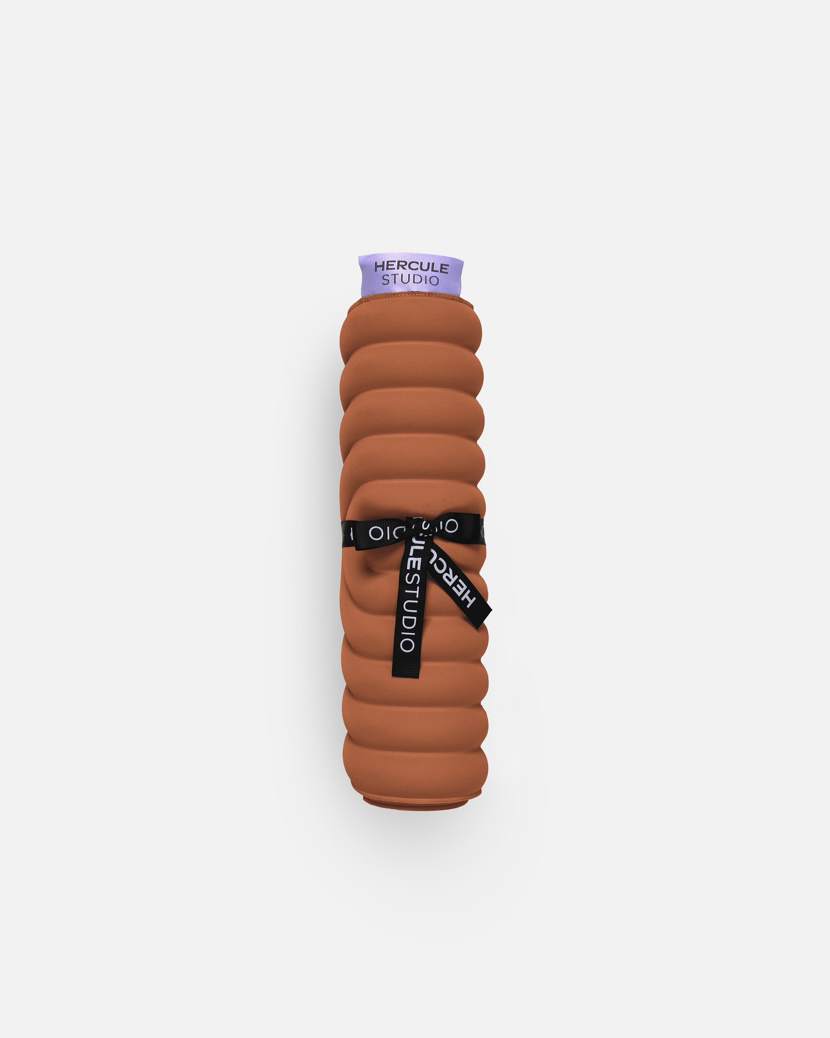 Hercule Studio Galé pad – terracotta portable 3-in-1 mini mat – convenient for transport and travel, suitable for Pilates/Reformer, durable French design, rolled view with logo ribbon