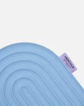 Close-up on the Hercule Studio Galé mini mat purple label with black logo – innovative blue jean 3-in-1 pad, ergonomic support for knees, elbows, glutes, durable design made in France