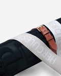 A closer look at the woven cotton fabric used in the gym mat strap—a durable and stylish material inspired by leather goods