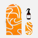Hercule Studio Bari Orange Pop printed essential bundle with the graphic Archy mat, the Galé 3-in-1 comfort pad and the sport mat sanitizing spray, design and responsible Pilates bundle made in France, product packshot