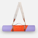 Hercule Studio Axel red and purple printed nomad bundle with the graphic Archy mat and a mat carrying strap for sport mats, practical and colorful duo for Pilates and fitness, French craftsmanship, packshot