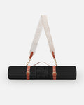 Hercule Studio Midnight Black nomad sport bundle pairing the premium Archy mat with the Soca mat carrying strap, essential accessory for yoga, Pilates and mobile training, durable French design, packshot image