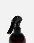Close-up on the Hercule Studio sanitizing spray trigger, fine mist to easily clean a sport or yoga mat