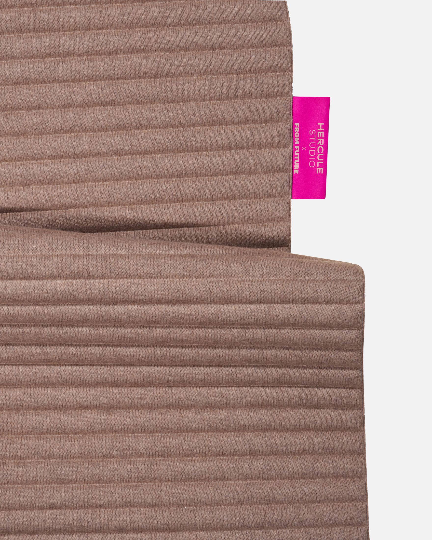 Custom Hercule Studio x From Future label detail on the Sandy Brown cashmere sport mat, premium finish
