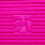 Zoom sur la texture cachemire rose fuchsia et logo H embossé du tapis de sport Hercule Studio x From Future Candy Pink