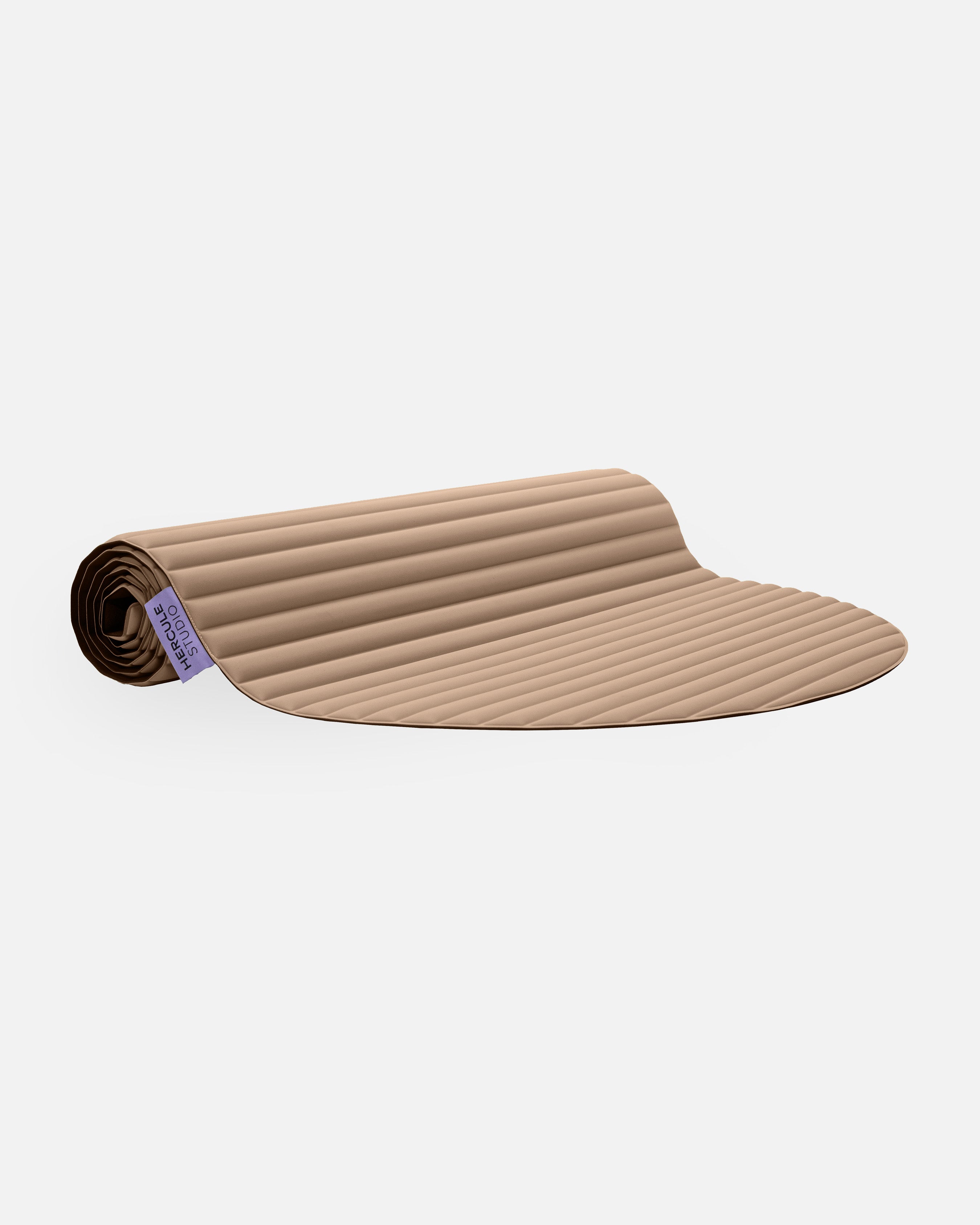 Hercule Studio Archy beige (Dune) design sport mat, durable mat for fitness and Pilates, half rolled view