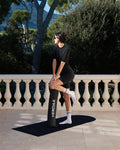 Hercule Studio Archy Midnight Black sport mat in Pilates lifestyle session, elegant black tone for fitness and yoga, made in France