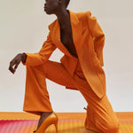 Tapis de sol pour le fitness le yoga et le pilates de la marque hercule studio en collaboration avec uchronia modèle archy imprimé summer déplié shooting mannequin