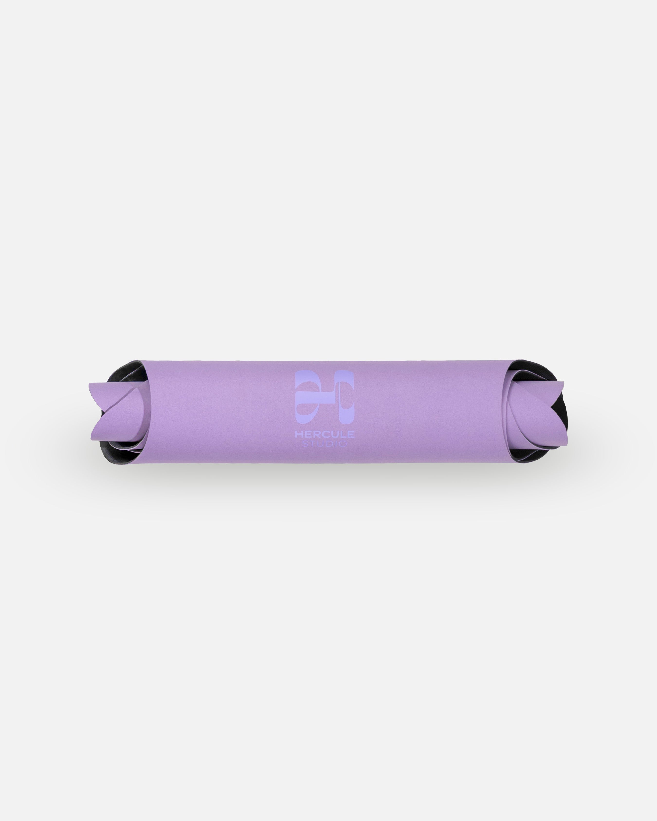 Packshot rolled view of the Hercule Studio Lavender purple yoga mat, PVC-free natural rubber, strong non-slip grip, eco-friendly