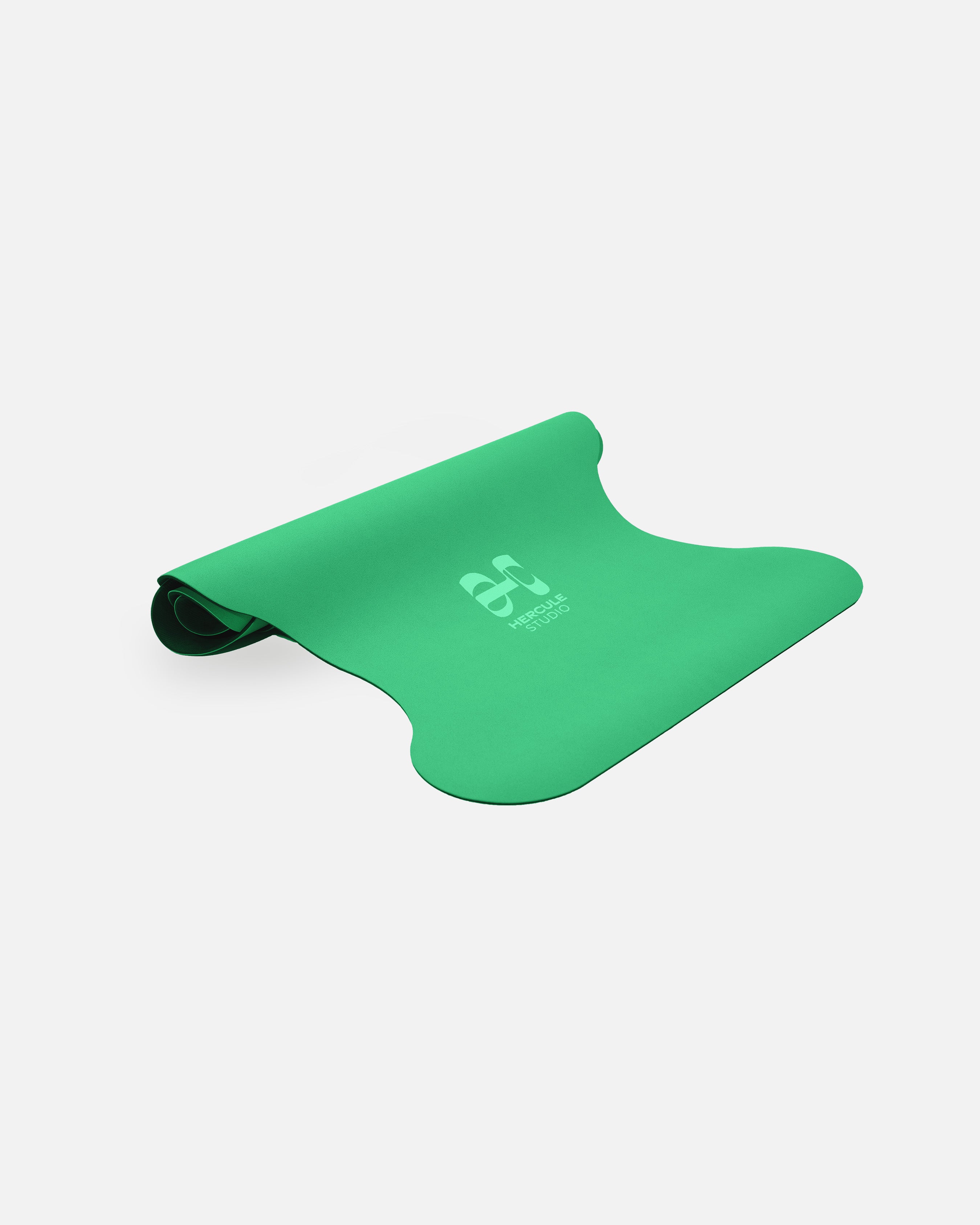 Half-rolled view of the Hercule Studio Golf Green sport yoga mat, resistant natural material, PVC-free, unique and stable design