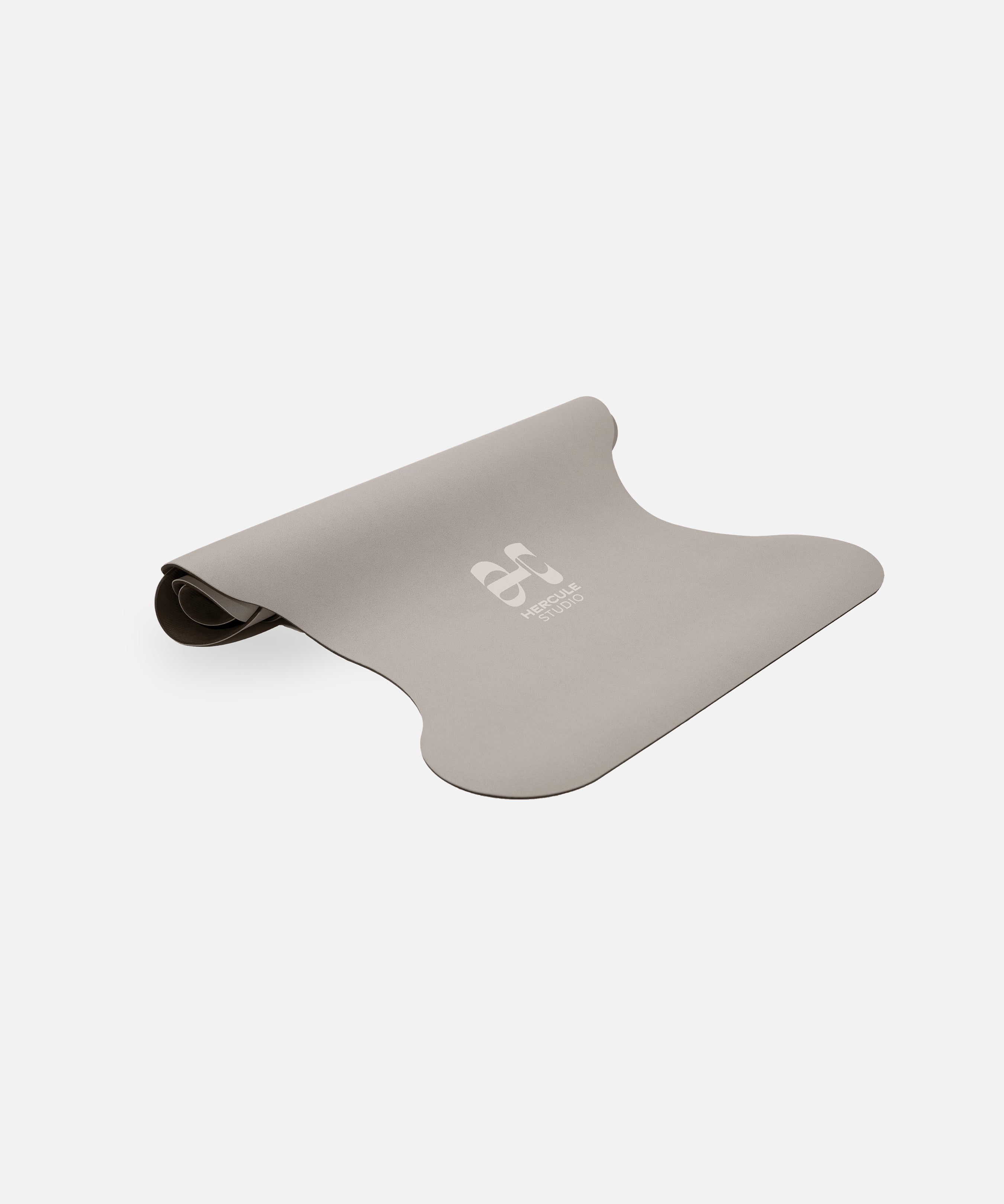 Vue semi-roulé tapis yoga Greige Hercule Studio, sans PVC, éco-responsable, confort et performance pour toutes postures