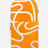 Hercule Studio Archy orange and ecru printed (Bari Orange Pop) arch-shaped sport mat, durable Made in France design mat for fitness, Pilates and stretching, half unrolled view