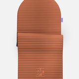 Hercule Studio Archy terracotta arch-shaped sport mat, durable premium Made in France exercise mat for fitness, Pilates and stretching, half unrolled view
