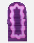 Hercule Studio x Univers Uchronia arch-shaped sport mat, Archy Winter purple printed model, durable Made in France design mat for fitness, Pilates and stretching, half unrolled view
