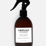 Hercule Studio Probiotic-Enriched Sanitizing Spray for Exercise Mats, a stylish 2-in-1 bottle designed to clean yoga and fitness mats and create an energizing atmosphere, made in France