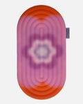 Hercule Studio Galé mini mat unrolled – limited edition Spring in collaboration with Univers Uchronia – pink background with large flower – portable 3-in-1 comfort pad, ergonomic support for knees, elbows, glutes, Reformer compatible, durable design made in France