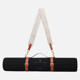 Soca Carrying strap for the Hercule Studio exercise mat, a stylish accessory for yoga, fitness, or Pilates mats, available in beige and camel
